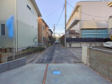 �_�ސ쌧����s�ғ����C��1���ڂ̐V�z��ˌ��Ă̑O�ʓ��H�܂ތ��n�ʐ^